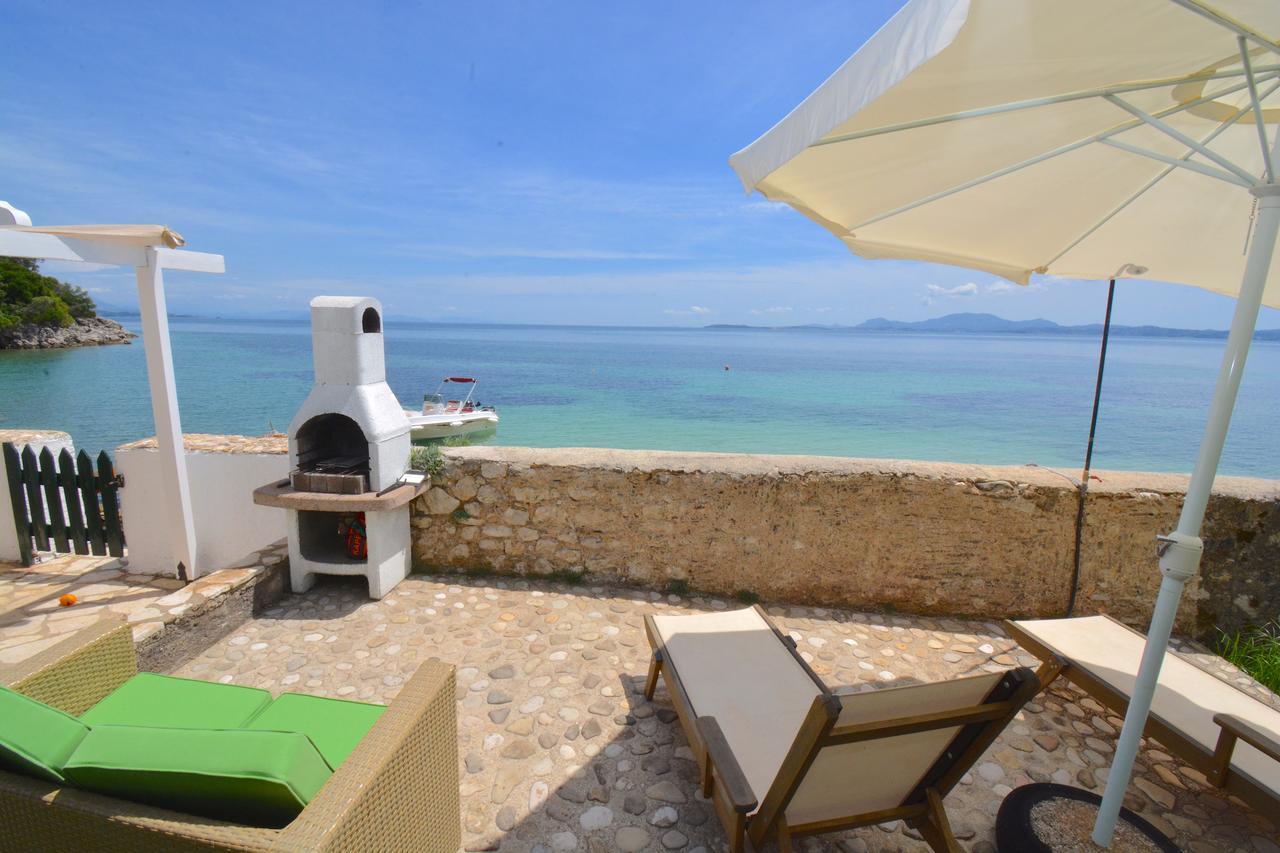 Nissaki Olive Press Villas Niszáki Kültér fotó